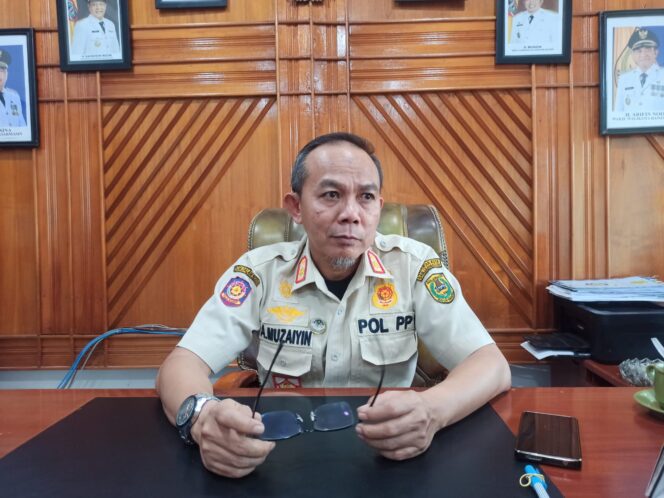 
 Kasat Pol PP Kota Banjarmasin, Ahmad Muzaiyin