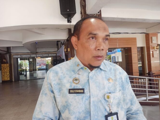 
 Kepala Dinsos Kota Banjarmasin, Dolly Syahbana