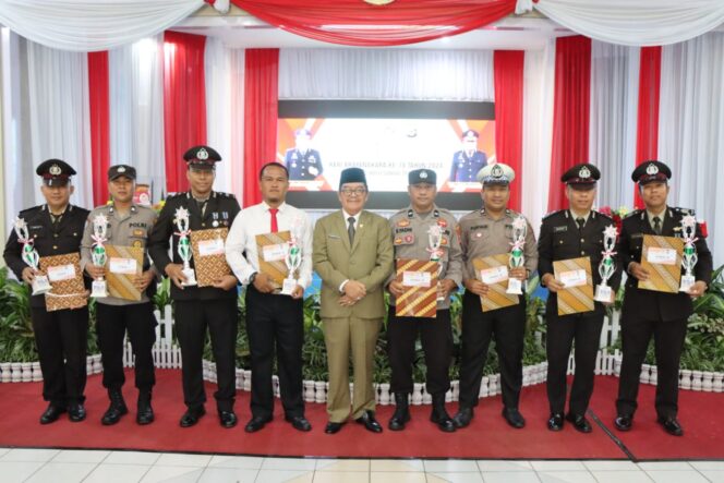 
 HUT ke 78 Bhayangkara di HST, Pesan Wabup Mansyah Menjaga Kondusifitas